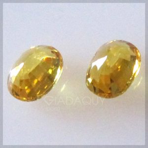 2-vien-da-sapphire-mau-vang-oval-cut-0-78-carats-409x409