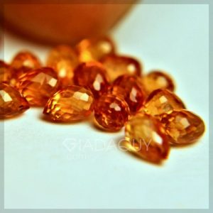 Bo-20-vien-da-quy-sapphire-mau-vang-hinh-giot-nuoc-6.58--carats