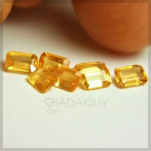 Bo-7-vien-da-quy-sapphire-mau-vang-step-cut-5.38-carats