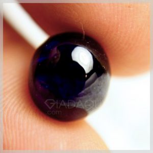 Da-sapphire-mau-xanh-den-mai-tron-11-64-Carats-409x409