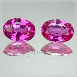 hai vien da sapphire mau hong oval cut 1.29 carats